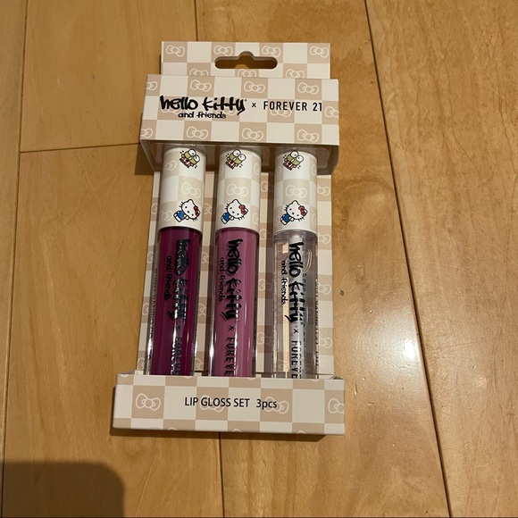 Hello Kitty Other - New hello kitty lip gloss trio